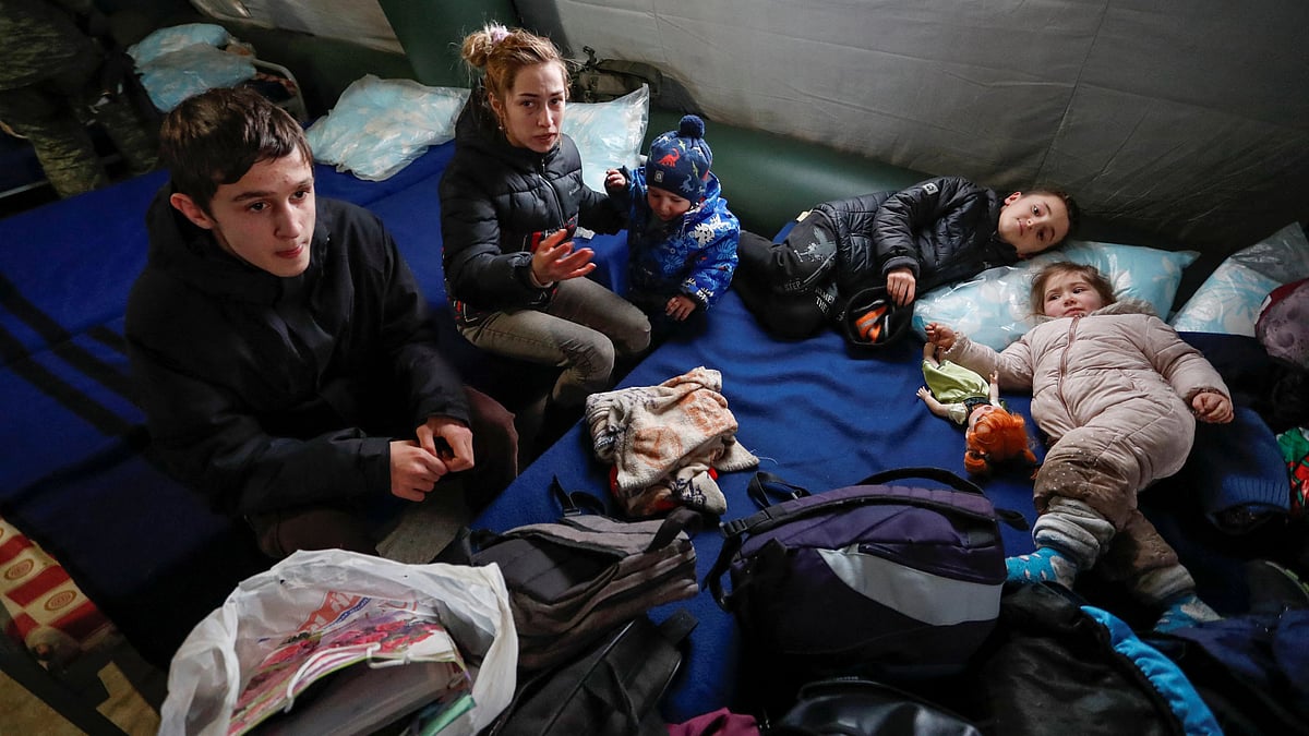 Evacuees from Mariupol area get settled at a refugee camp in the settlement of Bezymennoye during Ukraine-Russia conflict in the Donetsk region, Ukraine 8 March 2022.