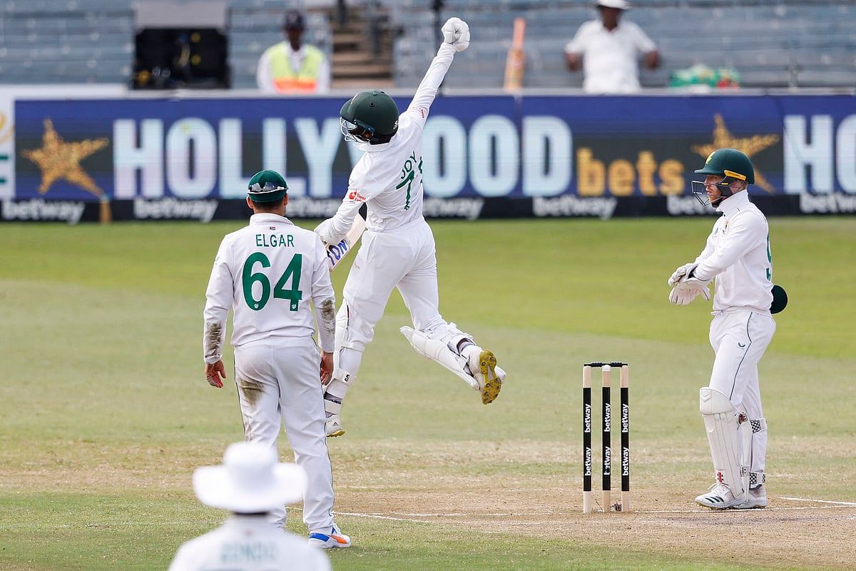 Bangladesh's Mahmudul Hasan Joy (C) celebrates after scoring a century (100 runs) during the third day of the first Test between South Africa and Bangladesh at the Kingsmead stadium in Durban on Friday.
