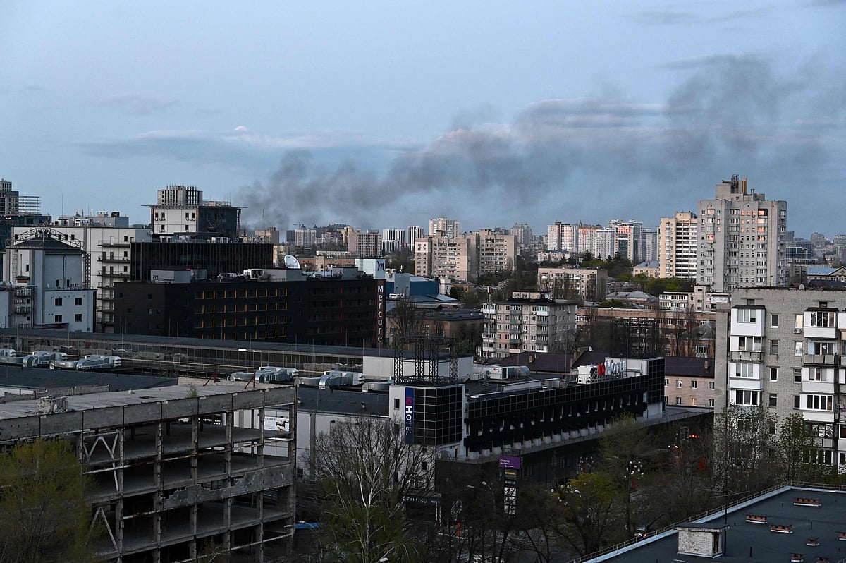 A photograph shows smoke above Kyiv after strikes on April 18, 2022, on the 64th day of the Russian invasion of Ukraine.