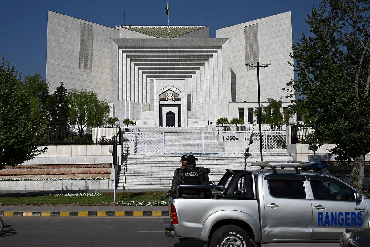 Rangers patrolalong a street past Pakistan's Supreme Court in Islamabad on 5 April, 2022, as the supreme court adjourned without ruling on the legality of political manoeuvres that led Prime Minister Imran Khan to dissolve the national assembly and call fresh elections