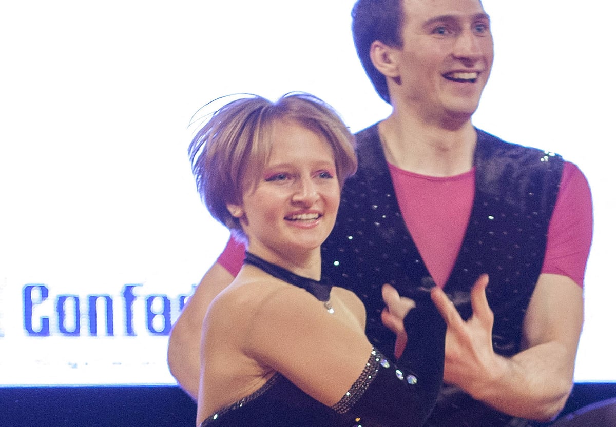 Katerina Tikhonova (L), daughter of Russian President Vladimir Putin, dances with Ivan Klimov during the World Cup Rock'n'Roll Acrobatic Competition in Krakow, Poland, in this 12 April, 2014 photo