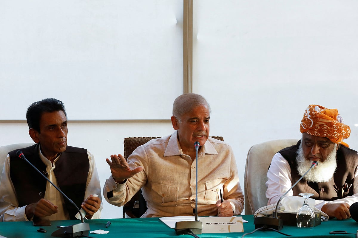 Mian Muhammad Shehbaz Sharif (Center), brother of ex-prime minister Nawaz Sharif, gestures during a joint press conference in Islamabad in Islamabad, Pakistan April 7, 2022