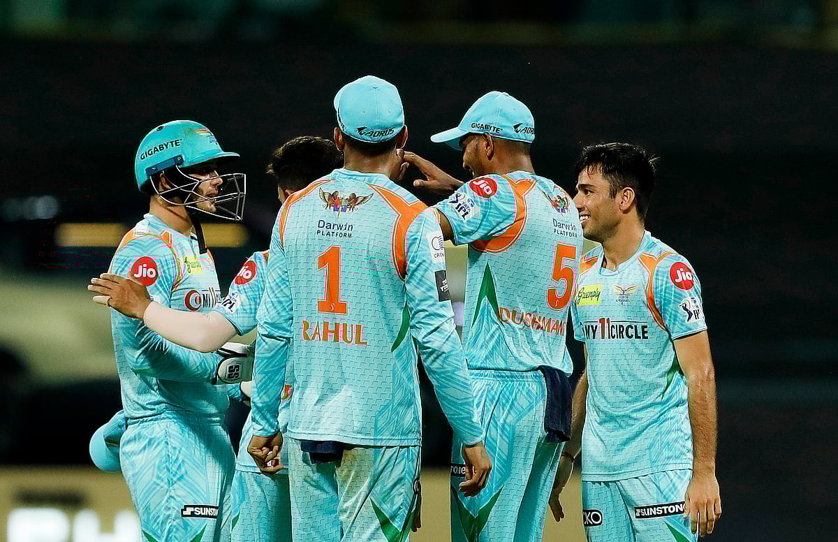 Lucknow Super Giants players celebrates the dismissal of Mumbai Indians Ishan Kishan during an IPL 2022 match between Lucknow Super Giants and Mumbai Indians at Wankhede Stadium in Mumbai on 24 April, 2022