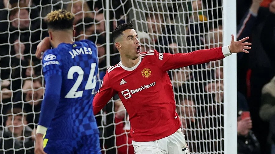 Manchester United forward Cristiano Ronaldo celebrates after scoring against Chelsea in their English Premier League match in Manchester on 29 April, 2022.