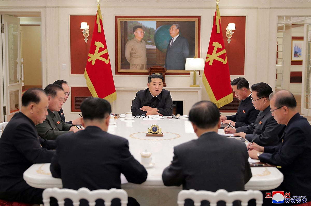 This picture taken on May 17, 2022 and released from North Korea's official Korean Central News Agency (KCNA) on May 18 shows North Korean leader Kim Jong Un (C) attending a meeting of the Presidium of the Political Bureau of the Central Committee of the Workers' Party of Korea in Pyongyang