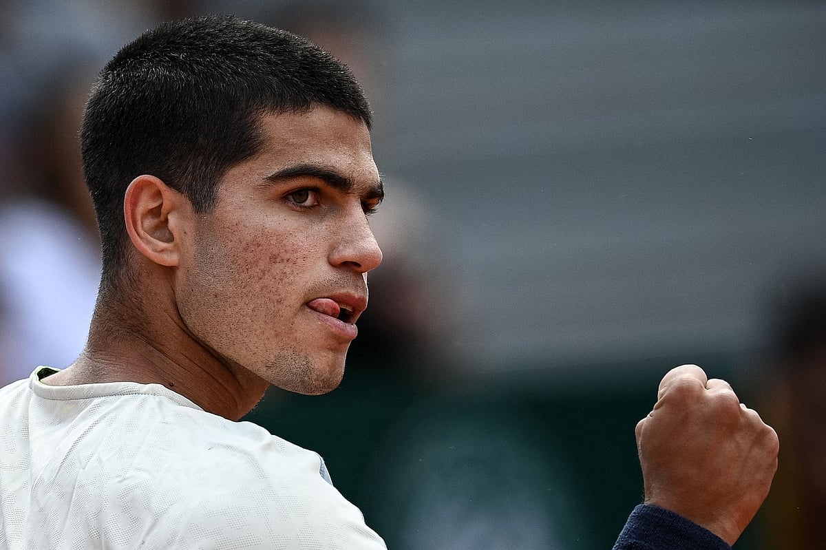 Spain's Carlos Alcaraz reacts as he plays against Spain's Albert Ramos-Vinolas during their men's singles match on day four of the Roland-Garros Open tennis tournament at the Court Simonne-Mathieu in Paris on 25 May, 2022