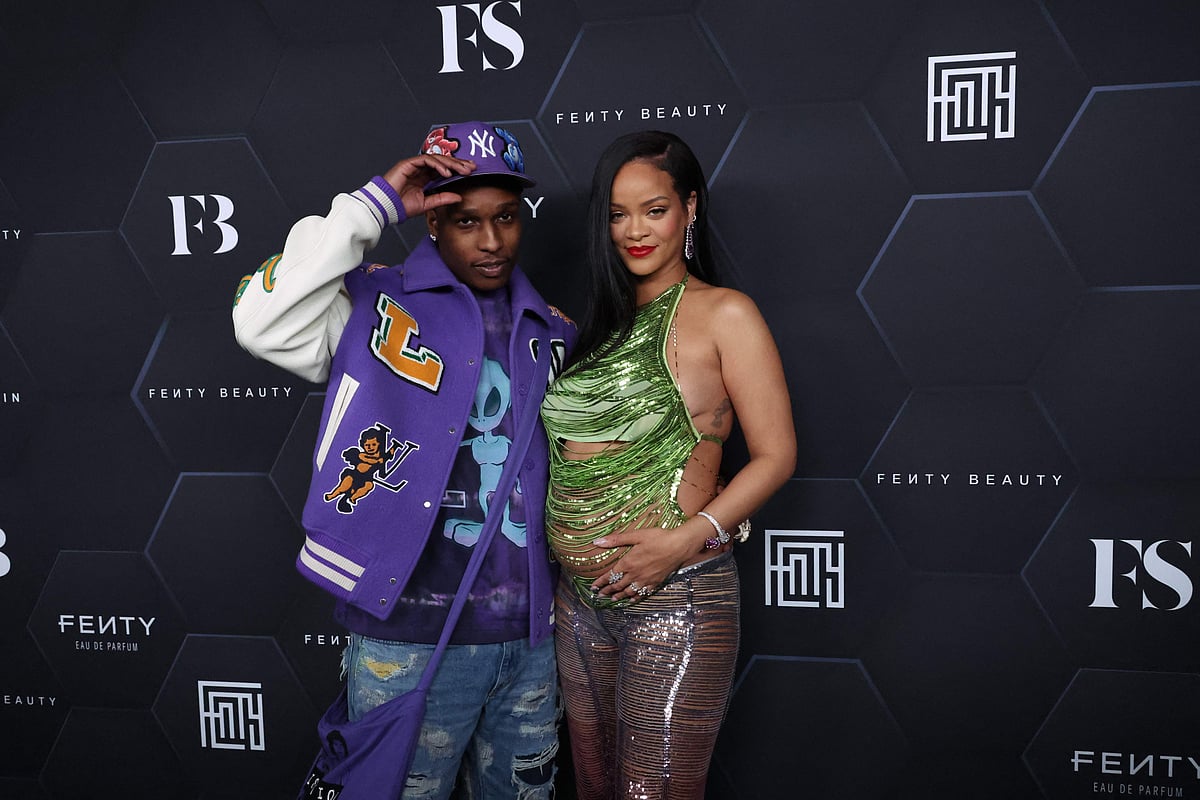 In this file photo taken on 11 February, 2022 ASAP Rocky and Rihanna pose for a picture as they celebrate her beauty brands Fenty Beauty and Fenty Skinat Goya Studios in Los Angeles, California. Superstar Rihanna and rapper A$AP Rocky have reportedly welcomed a baby boy, pop industry news website TMZ reported on 19 May, 2022.