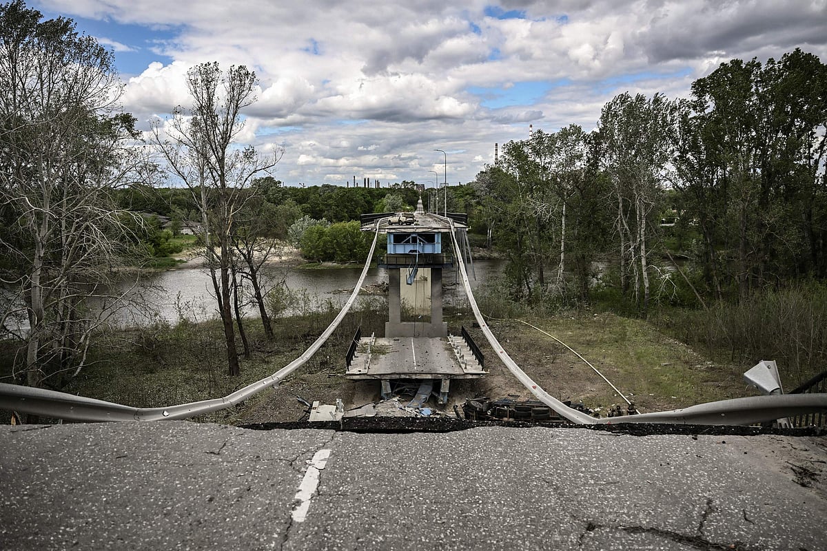 A picture taken on 22 May 2022, shows the destroyed bridge connecting the city of Lysychansk with the city of Severodonetsk in the eastern Ukranian region of Donbass, amid Russian invasion of Ukraine.