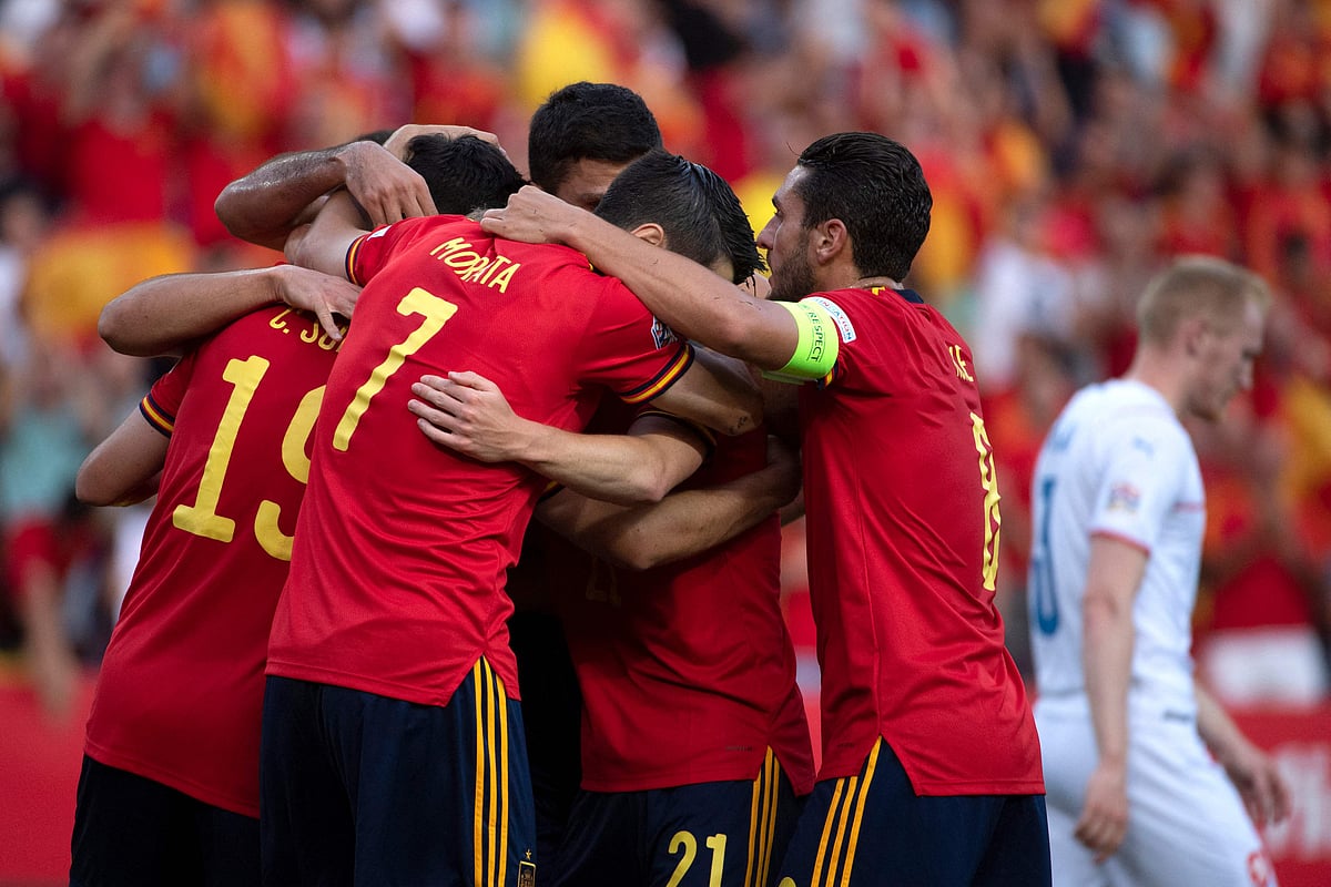 Spain's players celebrate their opening goal scored by midfielder Carlos Soler during the UEFA Nations League, league A group 2 football match between Spain and Czech Republic at at La Rosaleda stadium in Malaga on 12 June, 2022