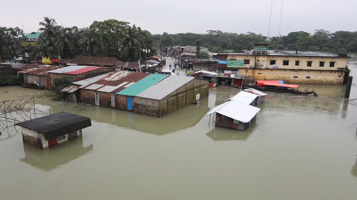 Floodwater submerges homes in Salutikor area of Gowainghat in Sylhet on 19 June 2022