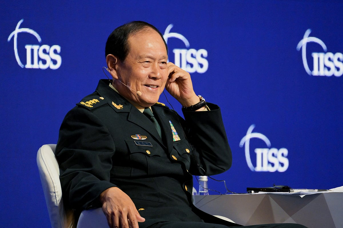 China's State Councilor and Defence Minister General Wei Fenghe answers questions from the audience at a plenary session during the 19th Shangri-La Dialogue in Singapore on 12 June 2022
