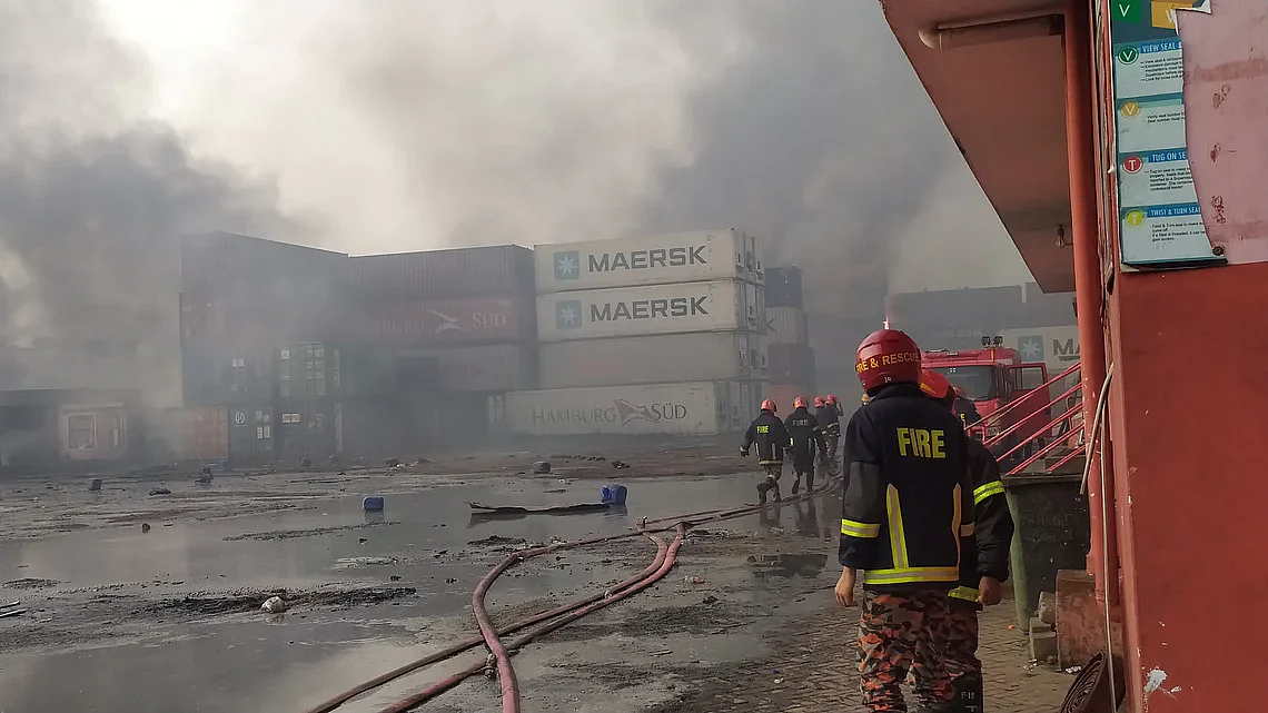 Smoke was seen spiraling out of the containers in the morning of 5 June 2022