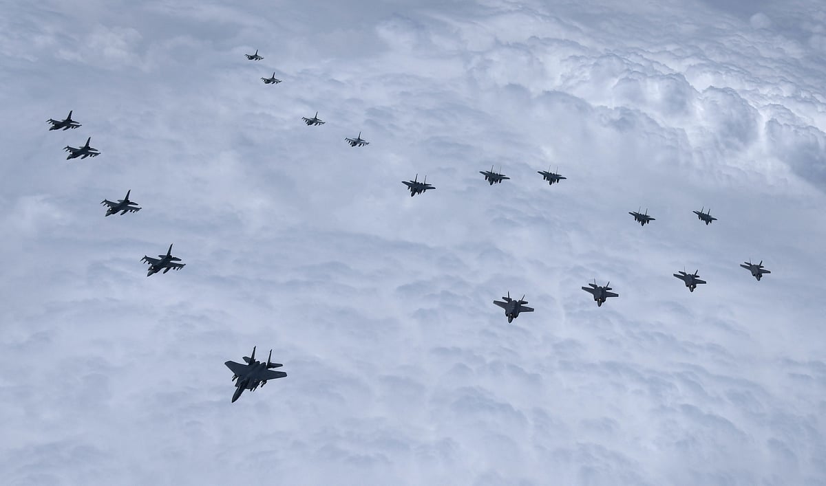 This handout picture taken on 7 June, 2022 and provided by the South Korean Defence Ministry in Seoul shows South Korean warplanes, including F-35 stealth fighters