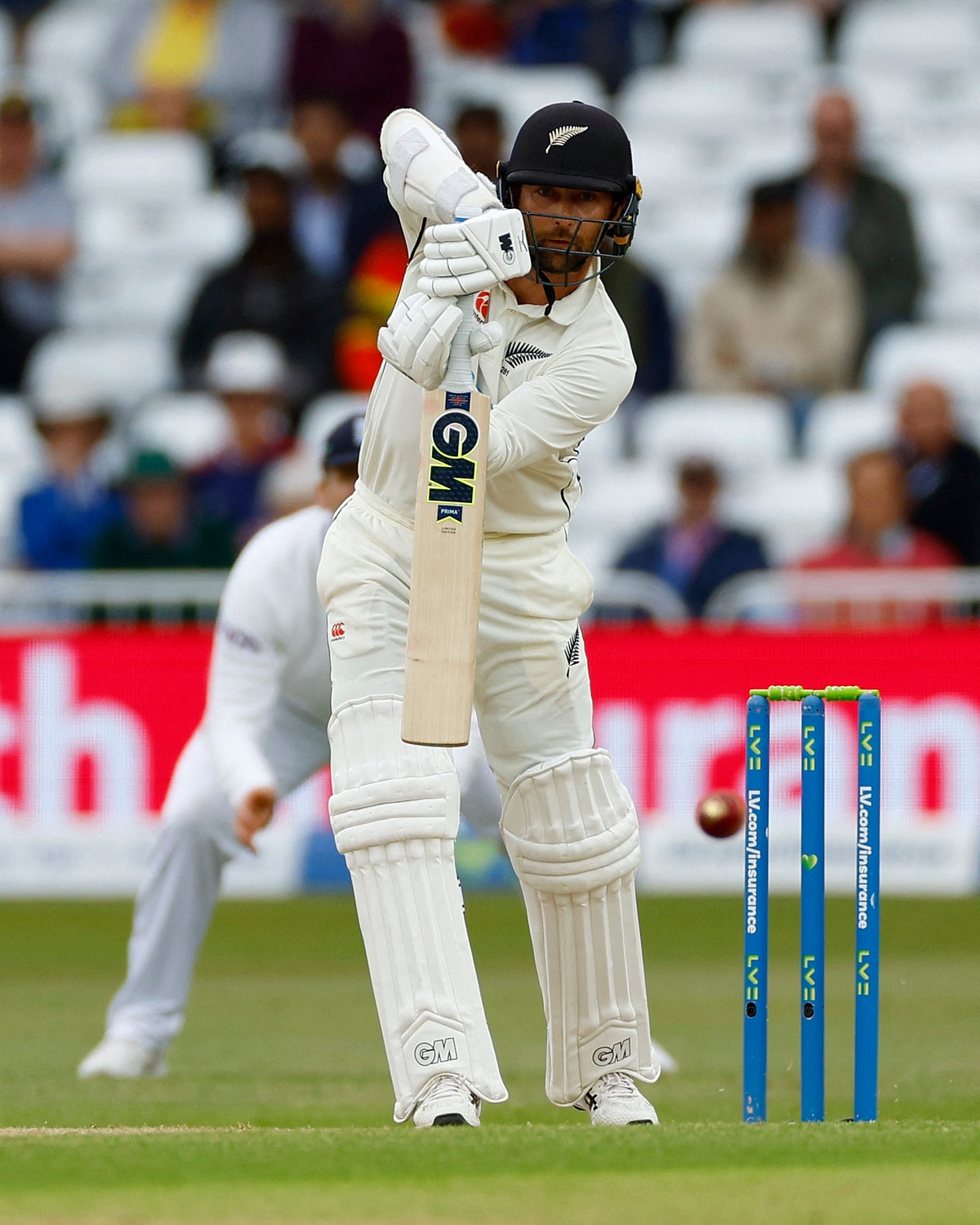 New Zealand's Devon Conway hits a four off the bowling of England's Stuart Broad