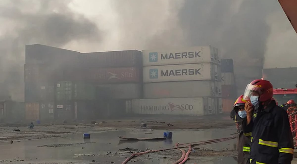 Firefighters struggling to breathe amidst the toxic air during the rescue operation