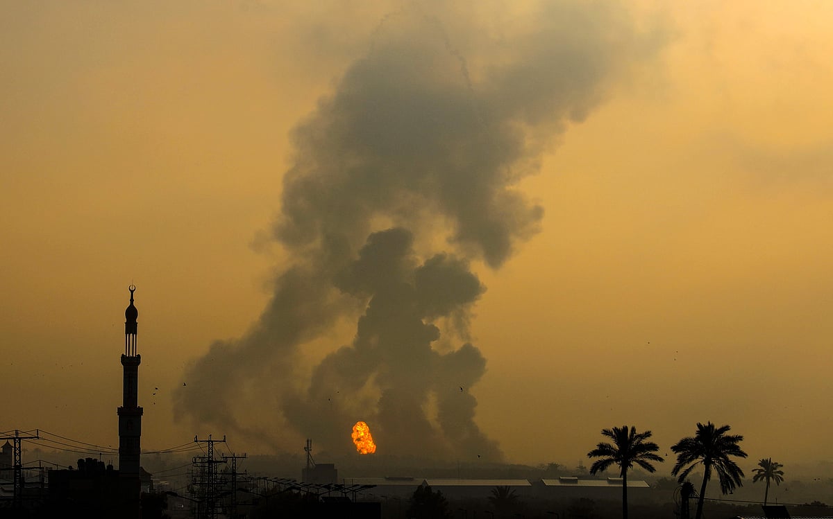 Smoke billows following an Israeli airstrike south of Gaza City on 18 June, 2022