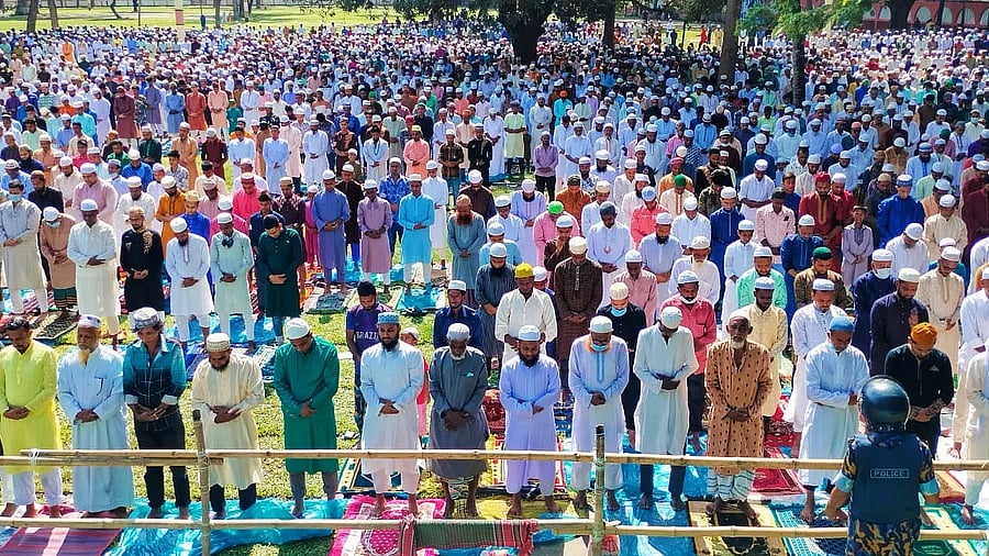 Muslims attend the Eid prayer at Sholakia on Sunday.