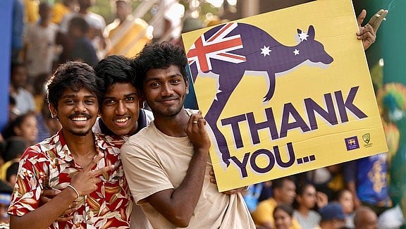 Sri Lanka fans thank the Australia team for touring their country during a dire economic crisis