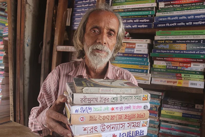Omar Sharif alias 'Boidadu' at his shop in Rangpur's Shaheed Jorrez Market.