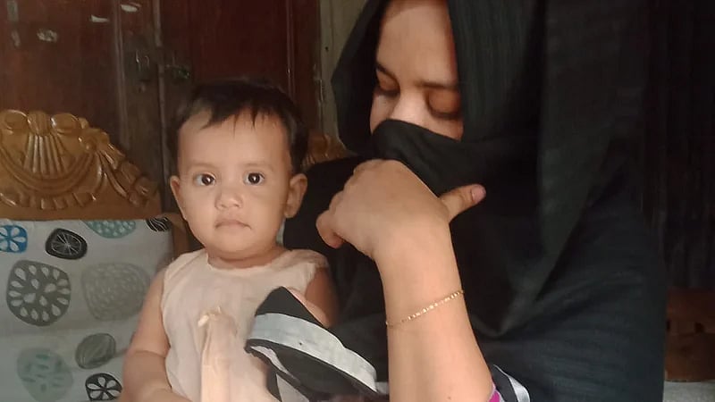 Ispahan Sultana with her 8-month-old daughter Faiza Rahman.