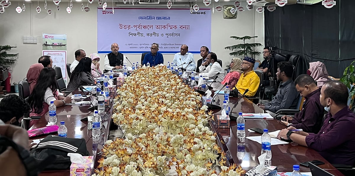 State minister for disaster management and relief Md Enamur Rahman and others at a roundtable in Dhaka on Thursday.