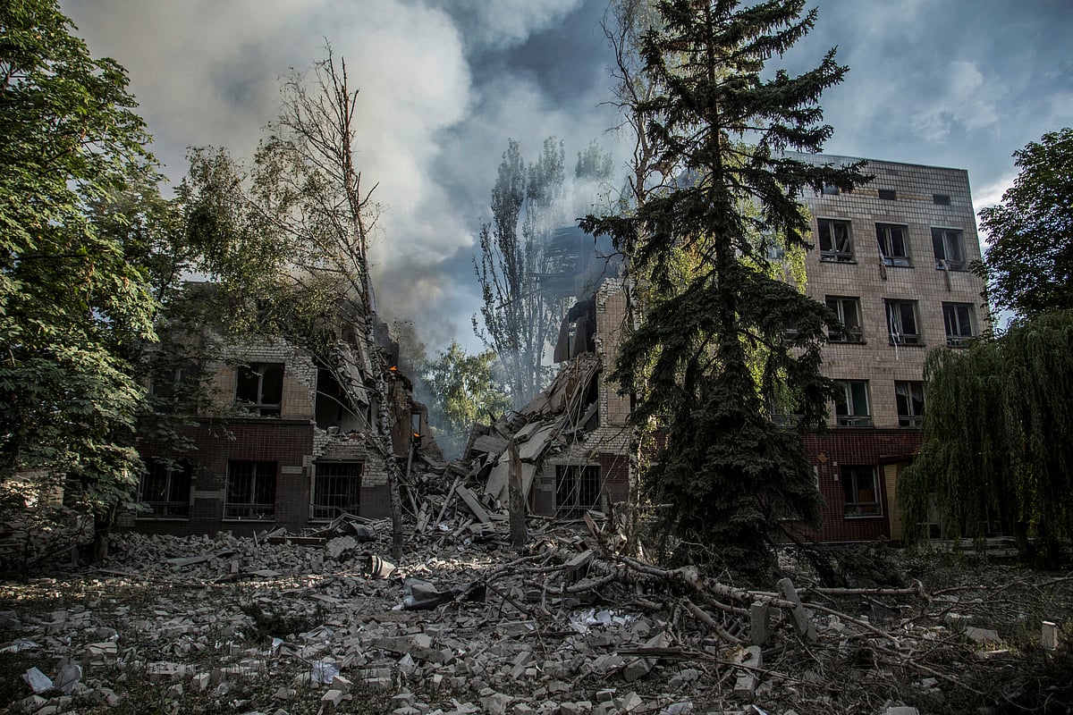 Smoke rises over the remains of a building destroyed by a military strike, as Russia's attack on Ukraine continues, in Lysychansk, Luhansk region, Ukraine 17 June, 2022
