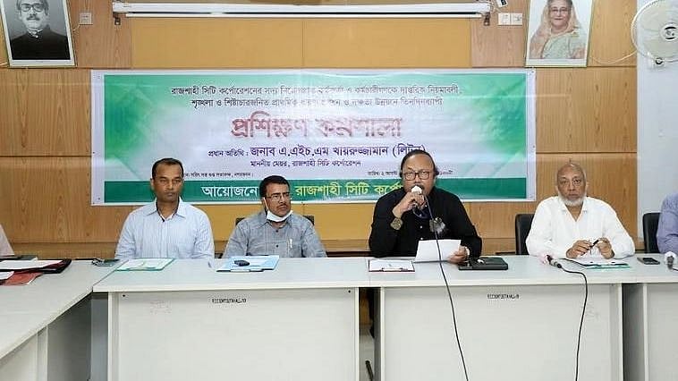Rajshahi City Corporation mayor Liton addresses the opening ceremony of a three-day orientation workshop for the newly recruited officers of the corporation at the City Bhaban conference hall on 2 August 2022