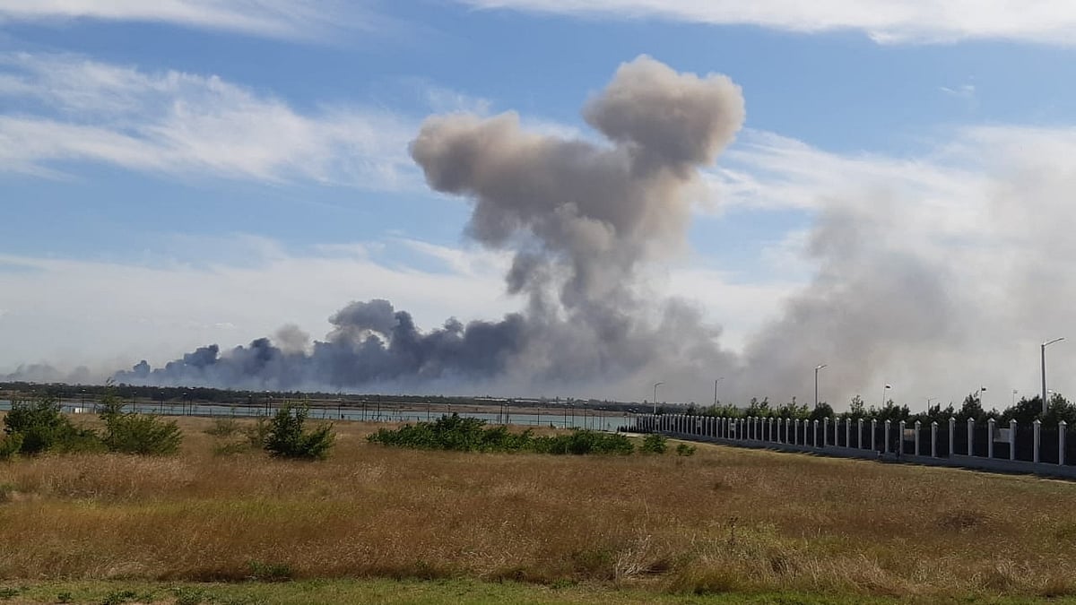Smoke rises after explosions were heard from the direction of a Russian military airbase near Novofedorivka, Crimea, in this still image obtained by Reuters on 9 August, 2022
