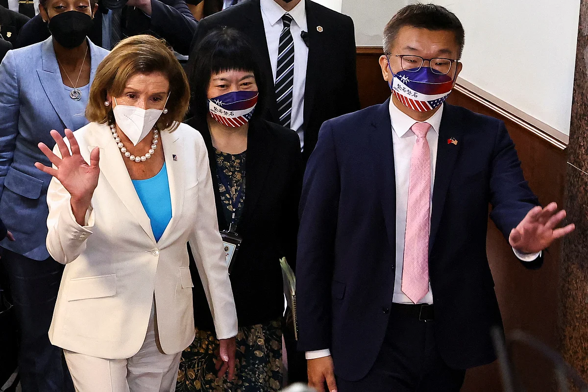 US House of Representatives speaker Nancy Pelosi walks next to Legislative Yuan vice-president Tsai Chi-chang as she leaves the parliament in Taipei, Taiwan on 3 August , 2022