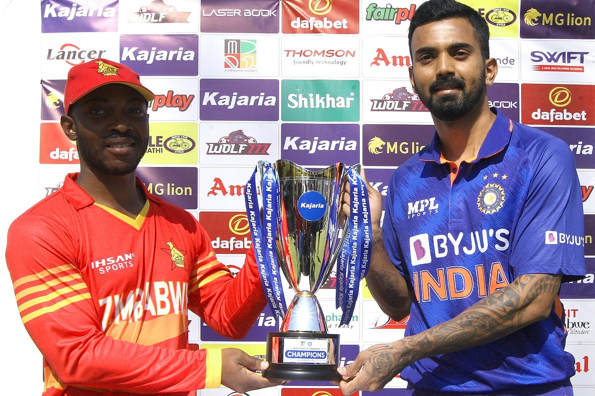 Zimbabwe skipper Regis Chakabva and India captain hold the trophy ahead of the first ODI match between the two teams
