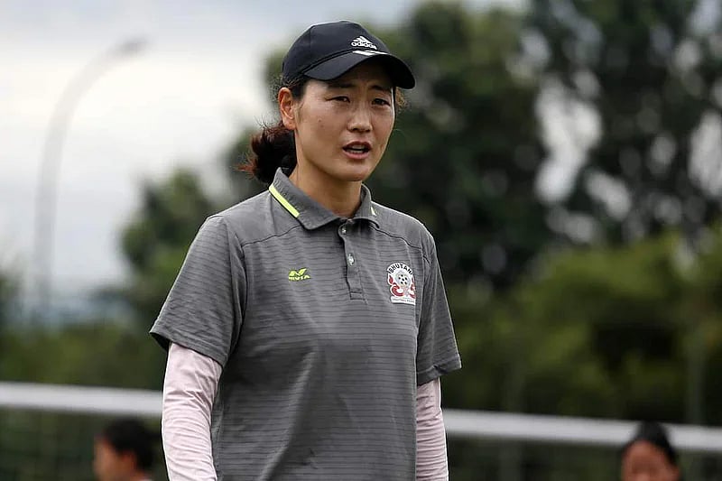 Hong Kyung-suk, the Korean-born coach of Bhutan Woman Football team.