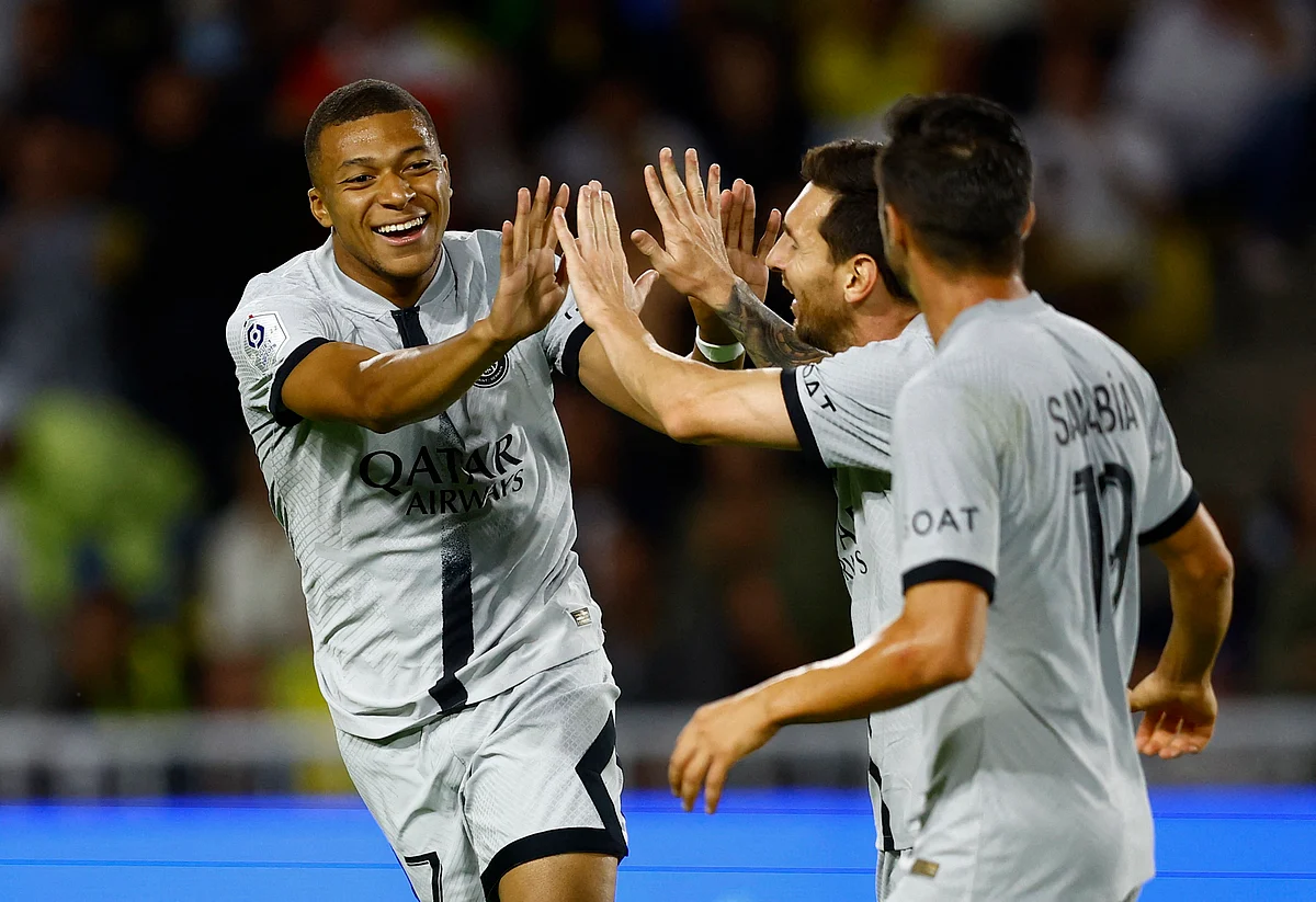 Paris St Germain's Kylian Mbappe celebrates scoring their first goal with Lionel Messi in their Ligue 1 match against Nantes at the Stade de la Beaujoire in Louis Fonteneau, Nantes, France one 3 September, 2022