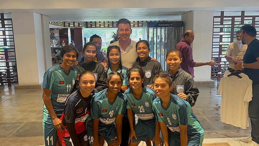 Bangladesh national women's football team players with former Australia pacer Brett Lee pose for a photo at the lobby of the Soultee hotel in Kathmandu, Nepal on 9 September, 2022