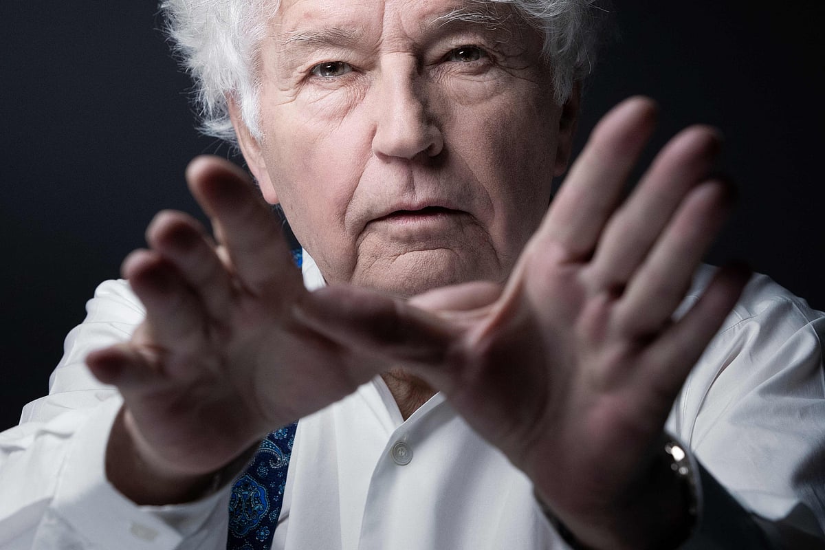 In this file photo taken on 9 March, 2022, French film director Jean-Jacques Annaud poses during a photo session in Paris