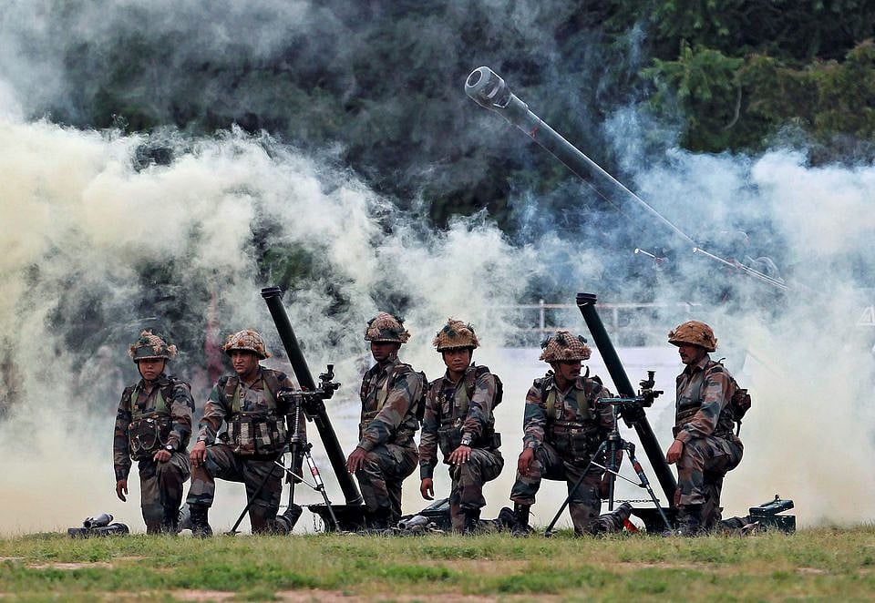 Indian Army soldiers participate in a war exercise during a two-day "Know Your Army" exhibition in Ahmedabad, India, on 19 August, 2016.
