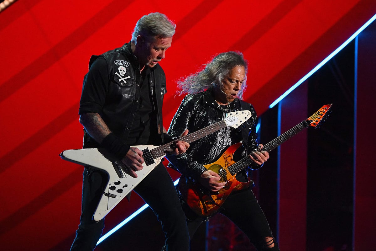 James Hetfield (L) and Kirk Hammett (R) of Metallica perform during the Global Citizen Festival at Central Park in New York on 24 September, 2022