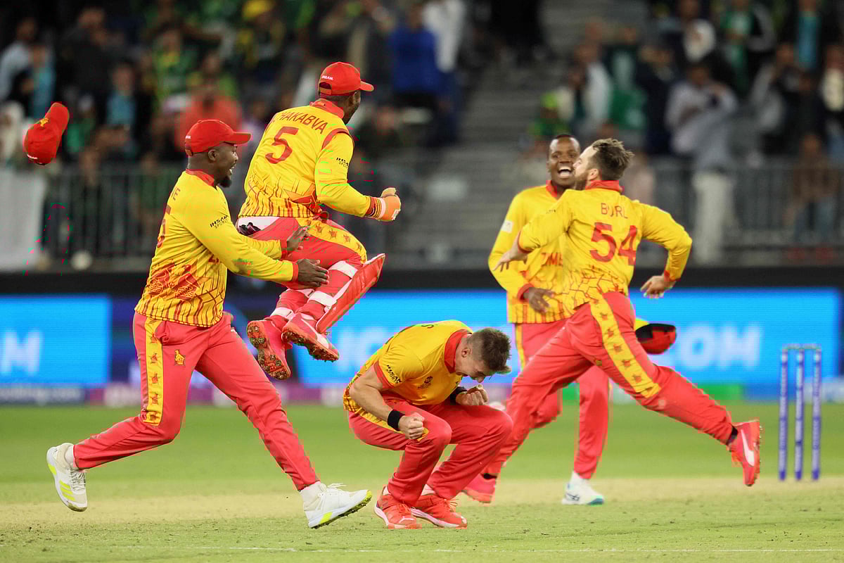 Zimbabwe's players celebrate their victory at the end of the ICC men’s Twenty20 World Cup 2022 cricket match between Pakistan and Zimbabwe in Perth on 27 October , 2022