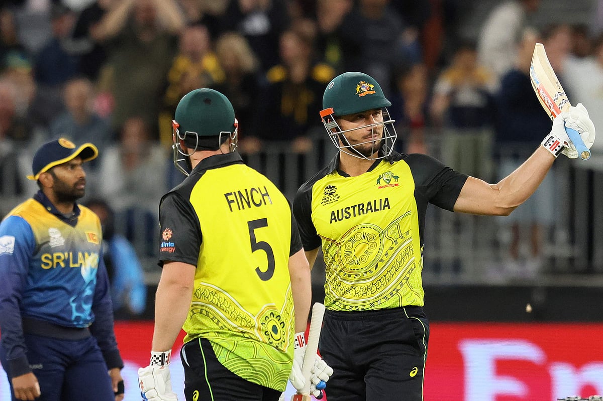 Australia's Marcus Stoinis (R) celebrates reaching his half century (50 runs) during the ICC men's Twenty20 World Cup 2022 cricket match between Australia and Sri Lanka at Perth Stadium on 25 October, 2022 in Perth