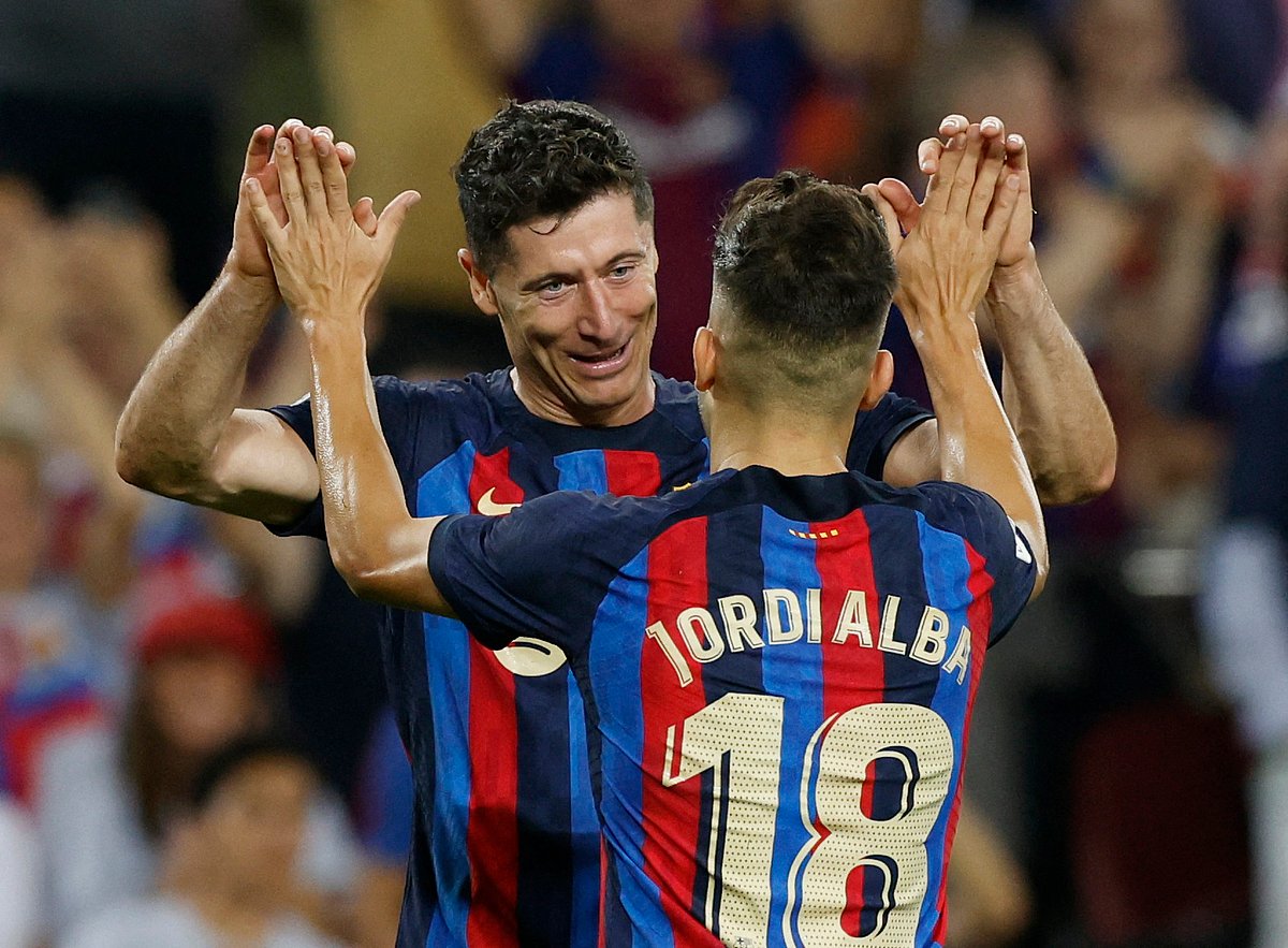 FC Barcelona's Robert Lewandowski celebrates scoring their second goal with Jordi Alba in their La Liga match against Villarreal at Camp Nou, Barcelona, Spain on 20 October, 2022