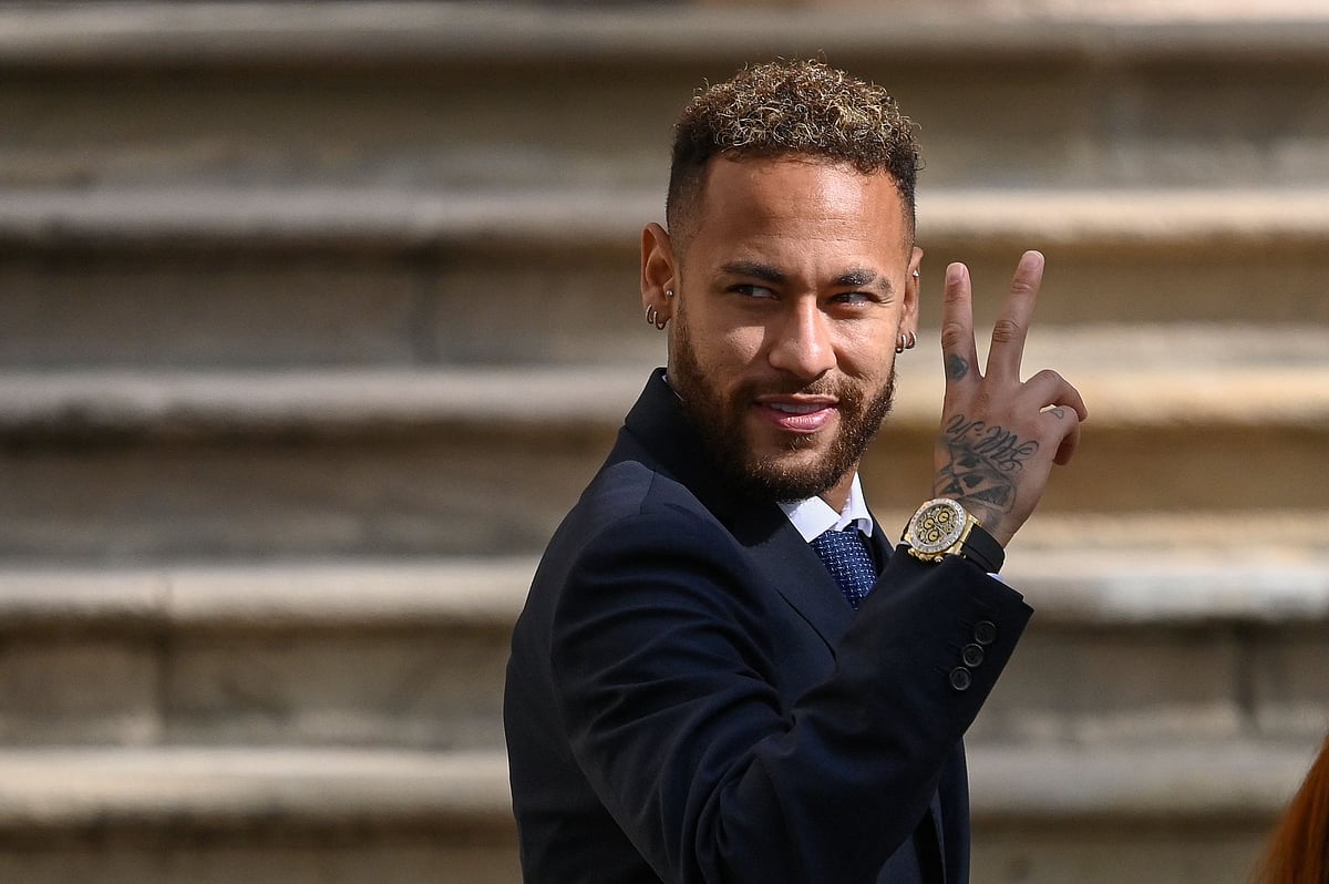 In this file photo taken on 18 October, 2022 Paris Saint-Germain's Brazilian forward Neymar gestures as he leaves after attending a hearing at the courthouse in Barcelona on 18 October, 2022