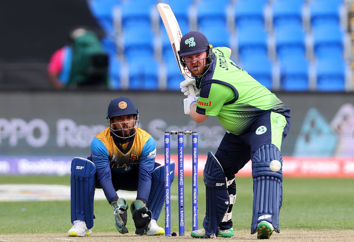 Ireland's Paul Stirling plays a shot watched by Sri Lanka's wicketkeeper Kusal Mendis during the ICC men's Twenty20 World Cup 2022 cricket match between Sri Lanka and Ireland at Bellerive Oval in Hobart on 23 October, 2022