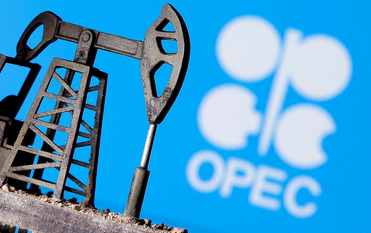 A 3D-printed oil pump jack is seen in front of displayed OPEC logo in this illustration picture