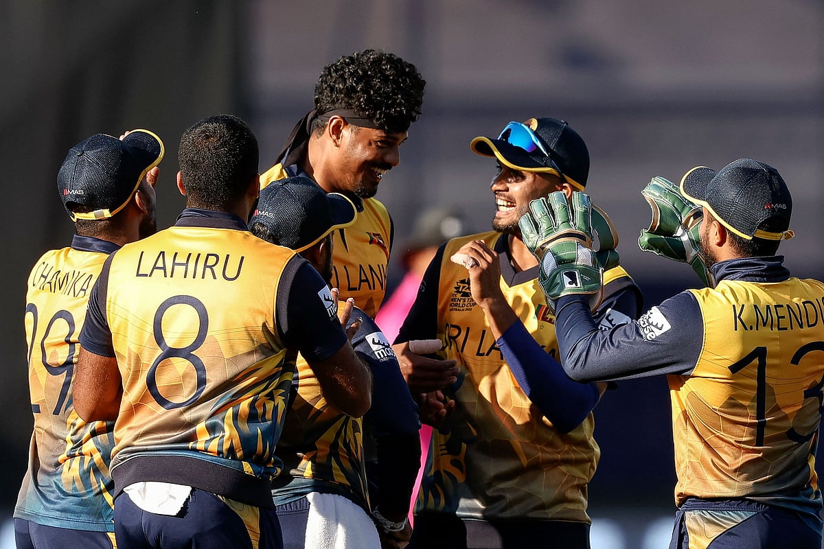 Sri Lanka's Binura Fernando (C) celebrates the wicket of Netherlands' Scott Edwards during the ICC men's Twenty20 World Cup 2022 cricket match between Netherlands and Sri Lanka at Kardinia Park in Geelong on 20 October, 2022