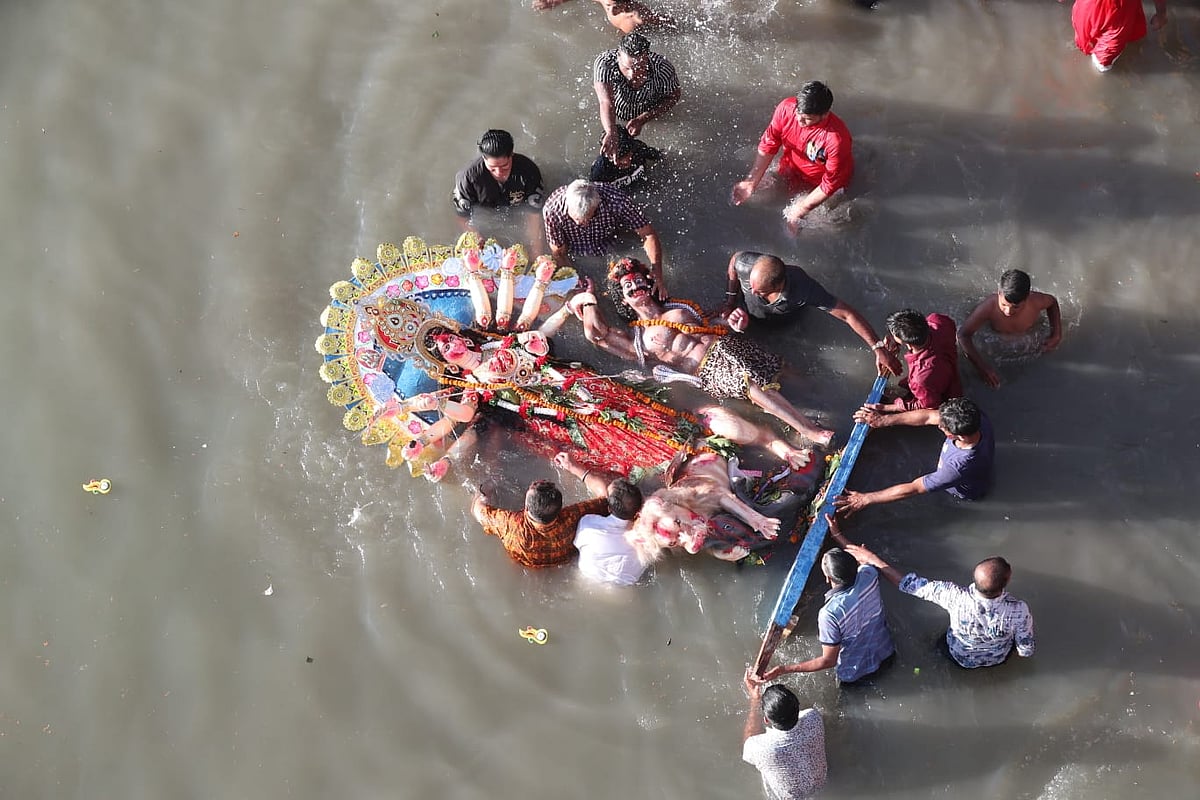 The biggest festival of Hindu community, Durga Puja, ends with immersion of idols in the river. The picture was taken from Turag river at Bachila in Dhaka on 5 October.