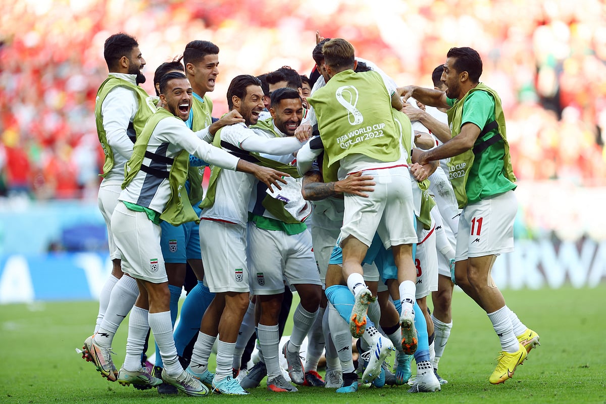 Iran's Roozbeh Cheshmi celebrates scoring their first goal with teammates in the FIFA World Cup 2022 Group B match of Wales v Iran at the Ahmad Bin Ali Stadium in Al Rayyan, Qatar on 25 November, 2022