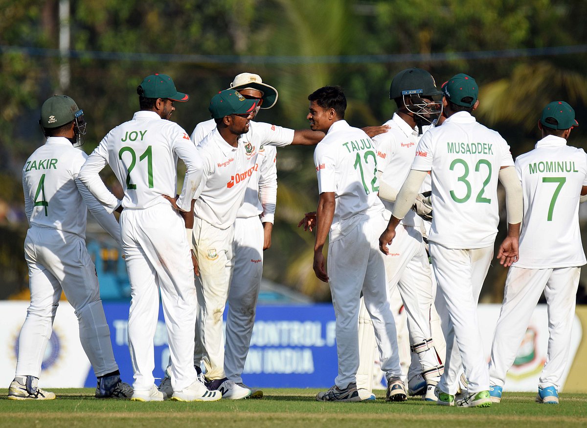 Taijul Islam celebrates with teammates after taking a wicket on Day 2 of the unofficial Test between Bangladesh A and India A at the Sheikh Kamal International Cricket Stadium in cox's Bazar on 30 November, 2022