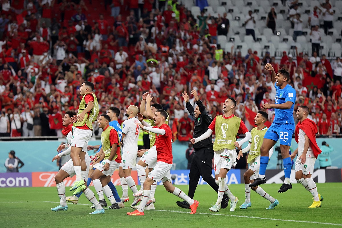 Morocco players celebrate after their win over Belgium in the FIFA World Cup 2022 Group F match at the Al Thumama Stadium in Doha, Qatar on 27 November, 2022