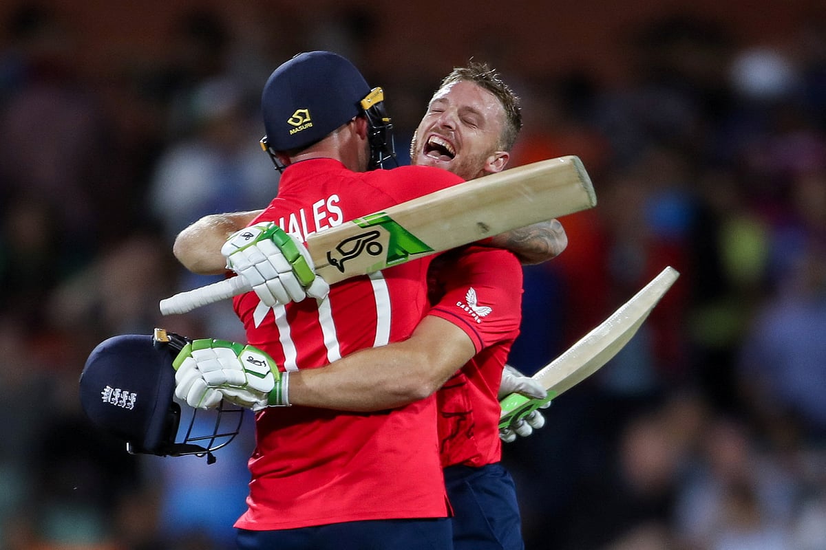 England's Jos Buttler and Alex Hales celebrate after winning  against India in the semifinal of the ICC Twenty20 World Cup at the Adelaide Oval on 10 November, 2022