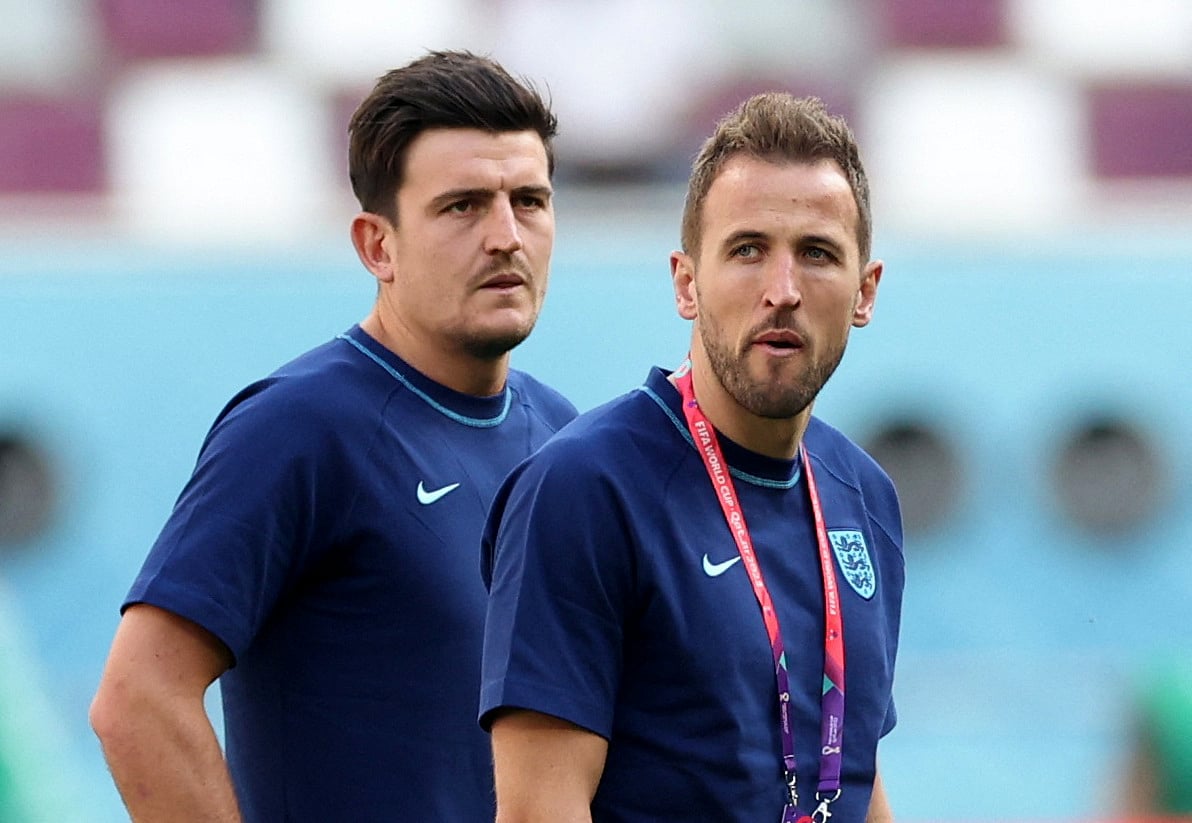 England's Harry Kane and Harry Maguire on the pitch before their FIFA World Cup 2022 Group B match against Iran at the Khalifa International Stadium, Doha, Qatar on 21 November, 2022
