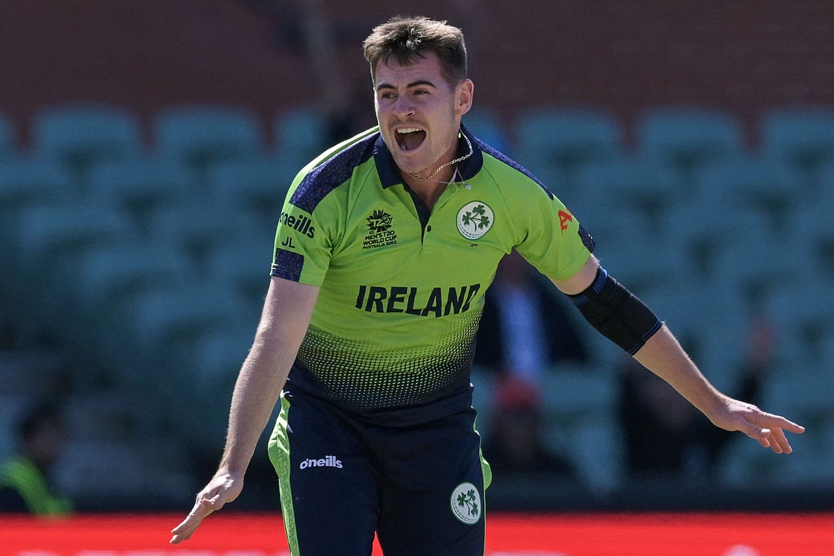 Ireland's Joshua Little celebrates as he scores a hat trick by bowling out New Zealand's Mitchell Santner during the ICC men's Twenty20 World Cup 2022 match between Ireland and New Zealand at the Adelaide Oval in Adelaide on 4 November, 2022